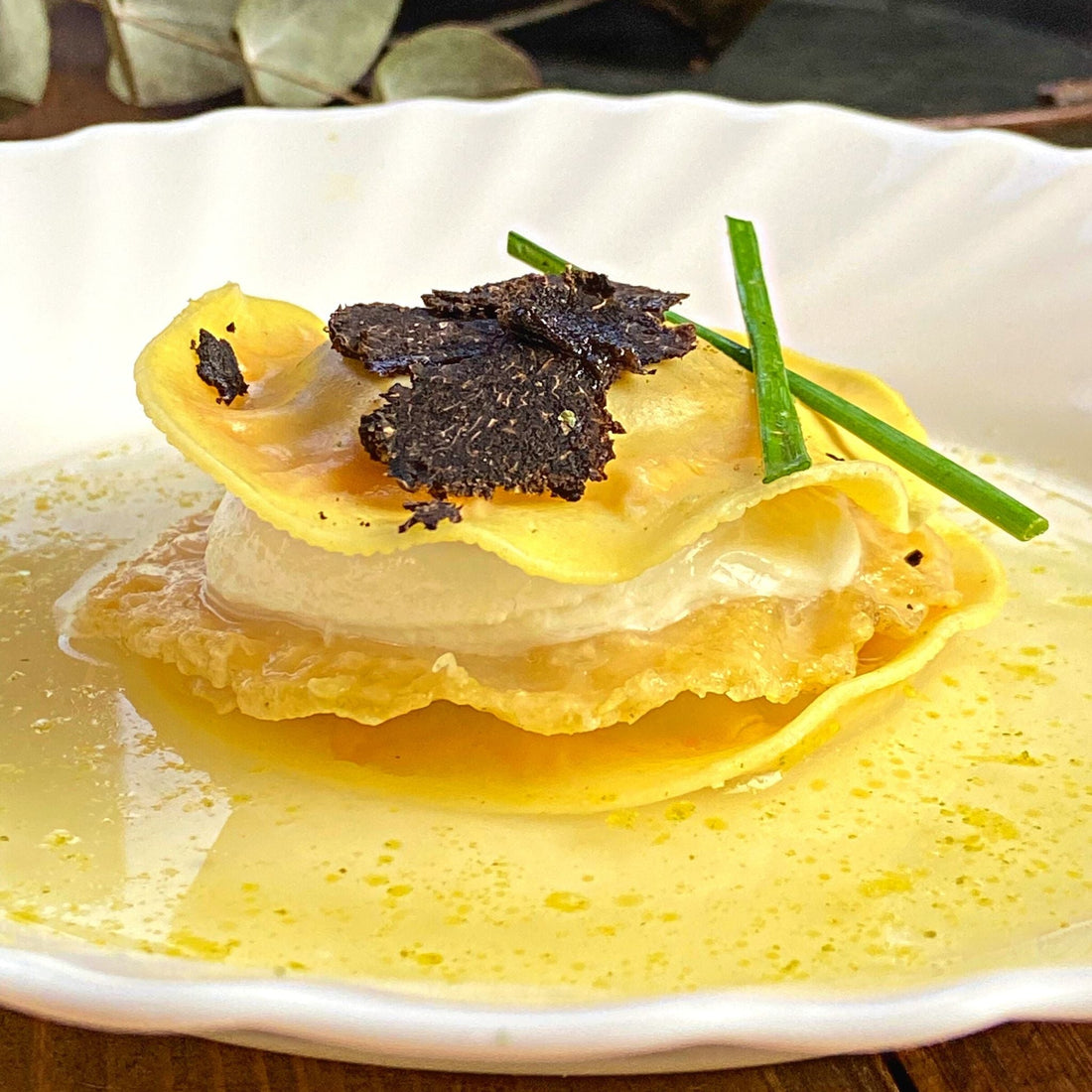 Millefoglie di cappellacci con croccante di parmigiano e Tartufo Nero Pregiato
