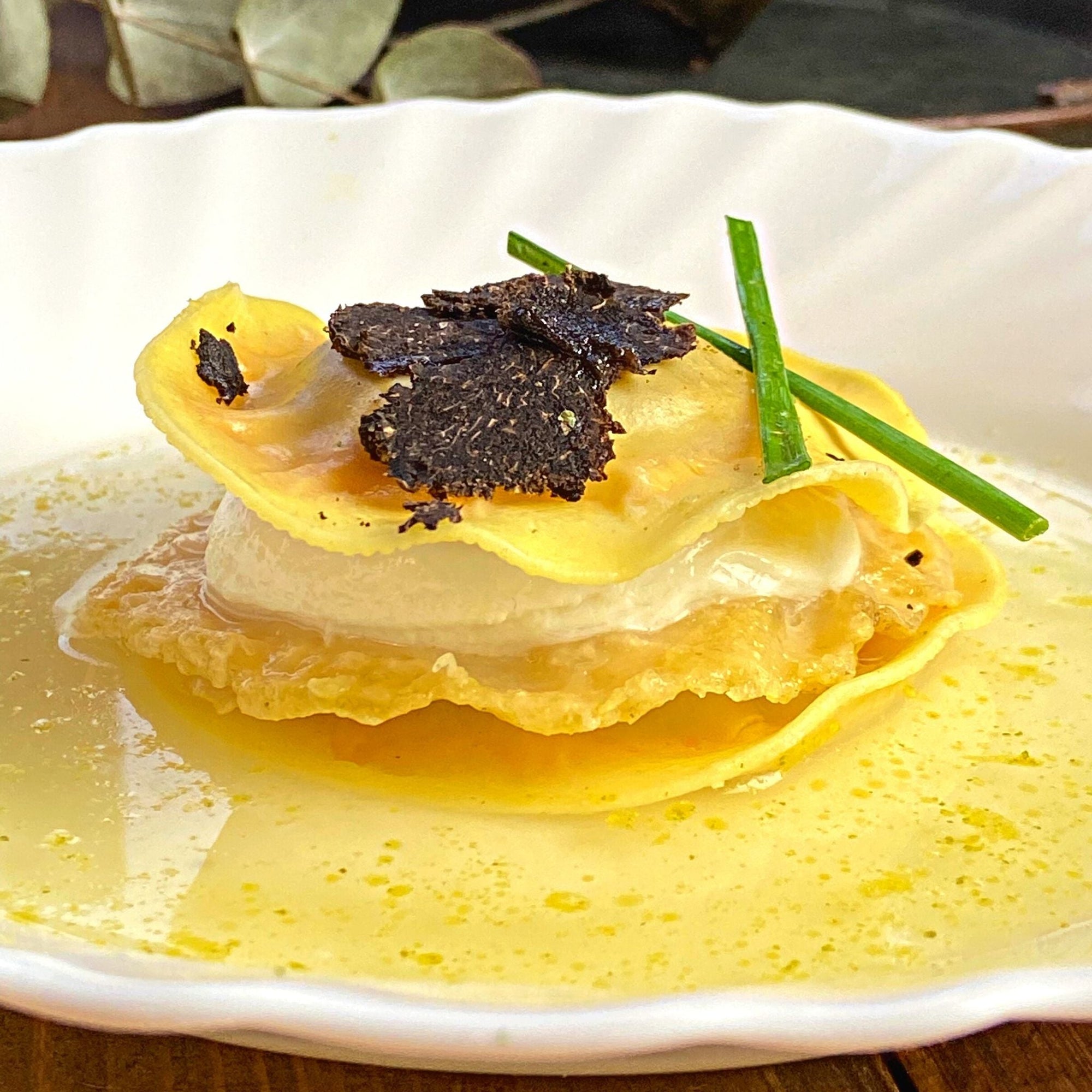 Millefoglie di cappellacci con croccante di parmigiano e Tartufo Nero Pregiato