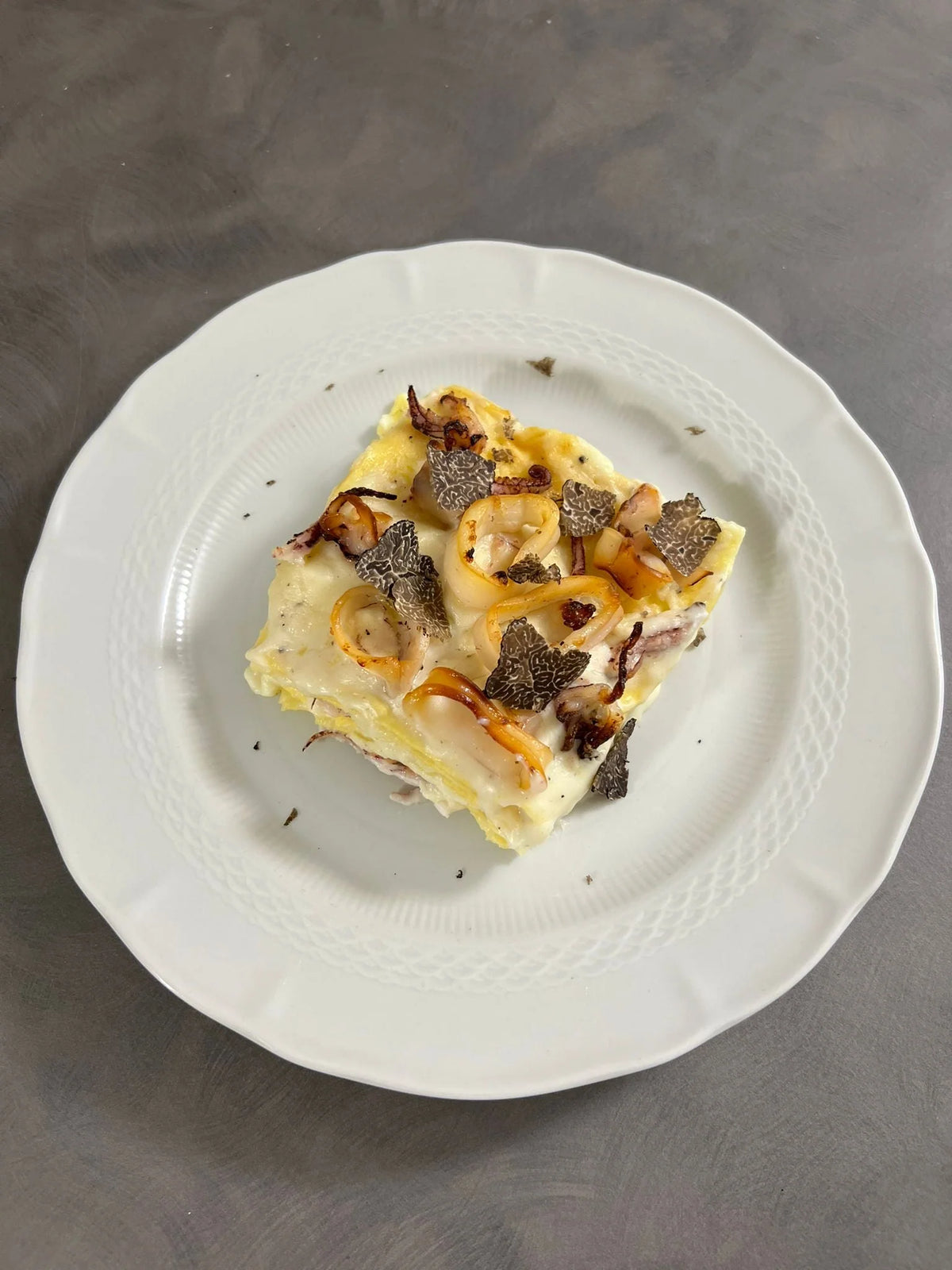 Lasagna al Tartufo Nero Pregiato e calamari