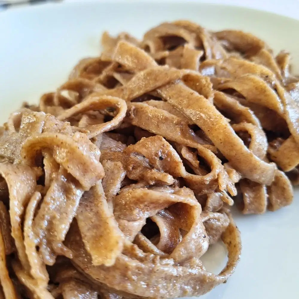 Tuorlo in raviolo e Tartufo Nero Pregiato