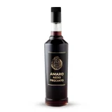 Bottiglia di Amaro Nero Pregiato. Liquore artigianale italiano con Tartufo Nero Pregiato.